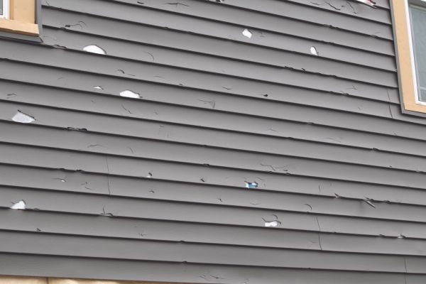 Damaged Siding Replacement in Sugar Land